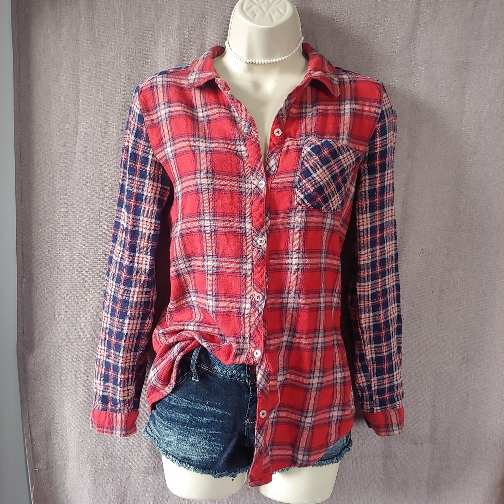 Pink Rose Small but I'd say fits XSmall red/navy button down flannel